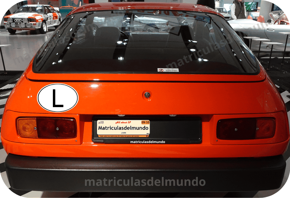 Red Porsche with the L code from Luxembourg